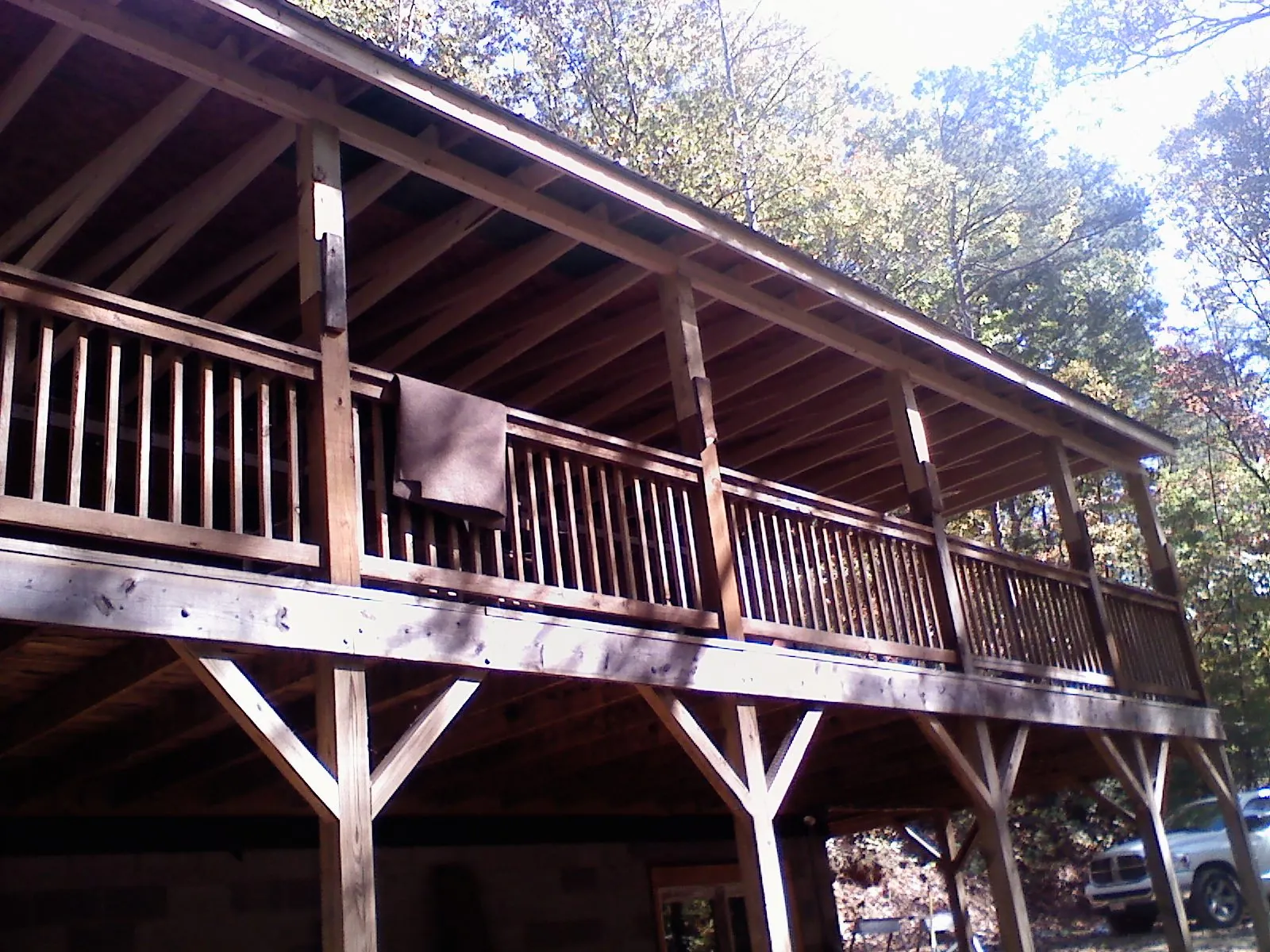 Timber framing under a new elevated porch and deck — Roof Leak Repair in Malden by Roofing Brothers